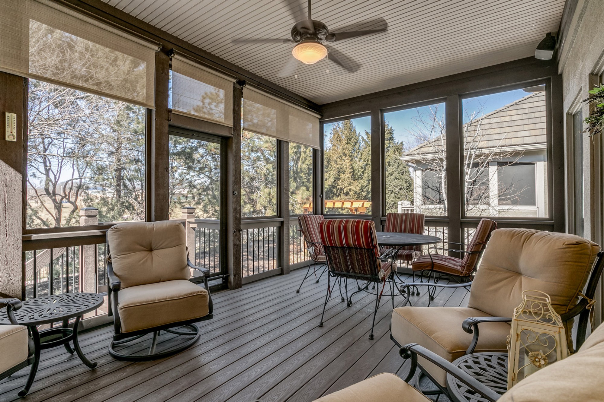 Outside, the entertaining continues on the huge screened porch added by the current owner with lighted ceiling fan, sun shades and overhead speakers.