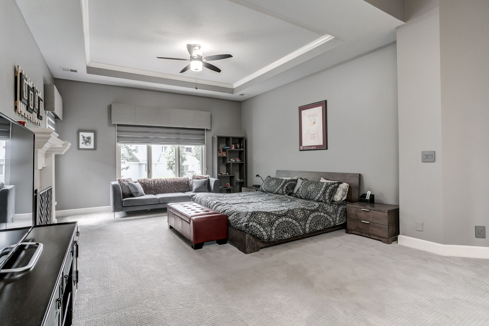 Soaring ceilings give additional spatial feel to this room.