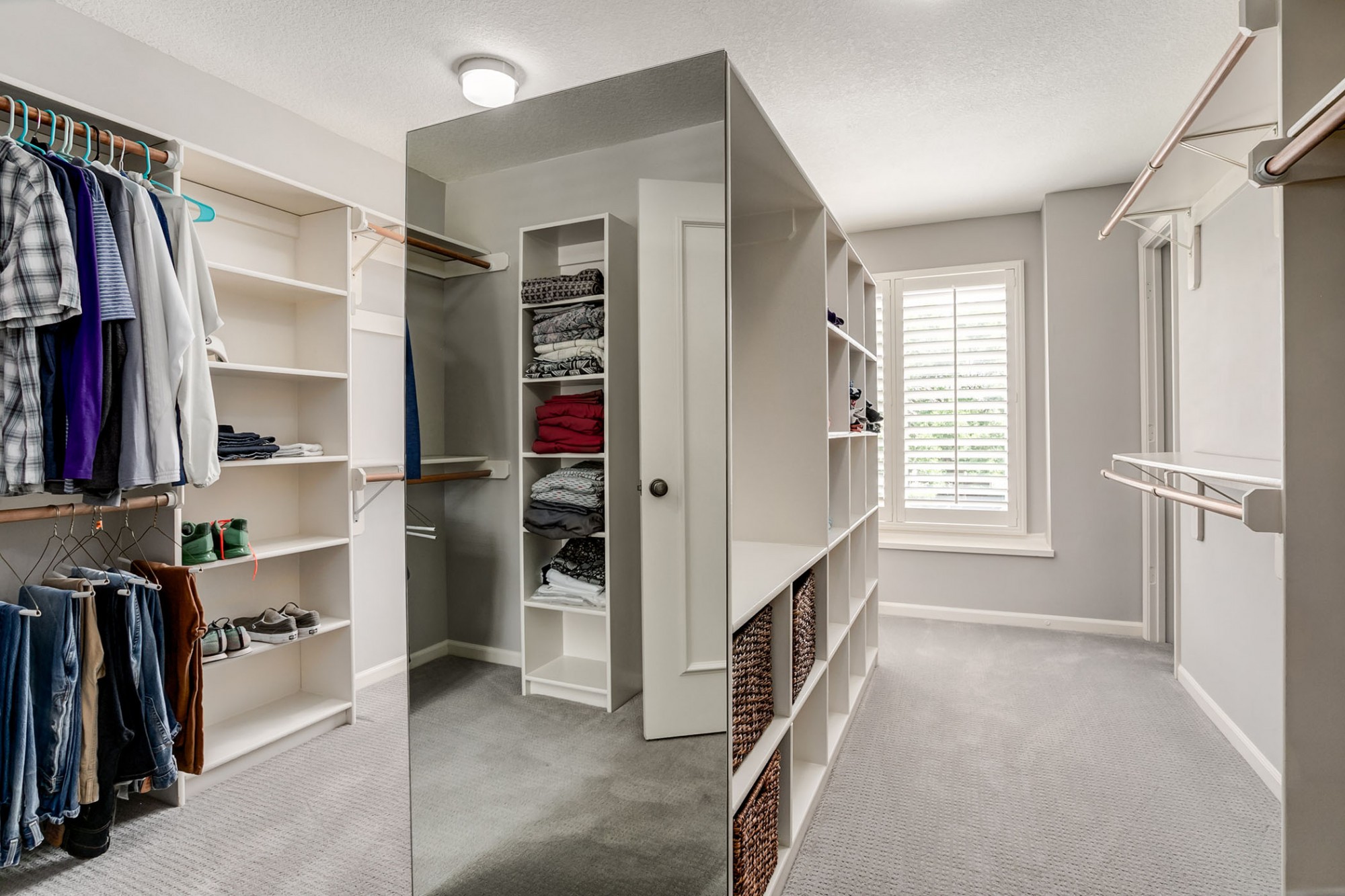 This is one of four master closet spaces! This is the main room, plus there's a closet with cedar wall and two additional closets!